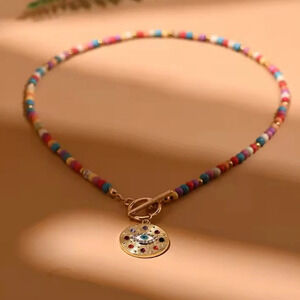 Boho Rainbow Beaded Necklace with Dazzling Gold Medallion